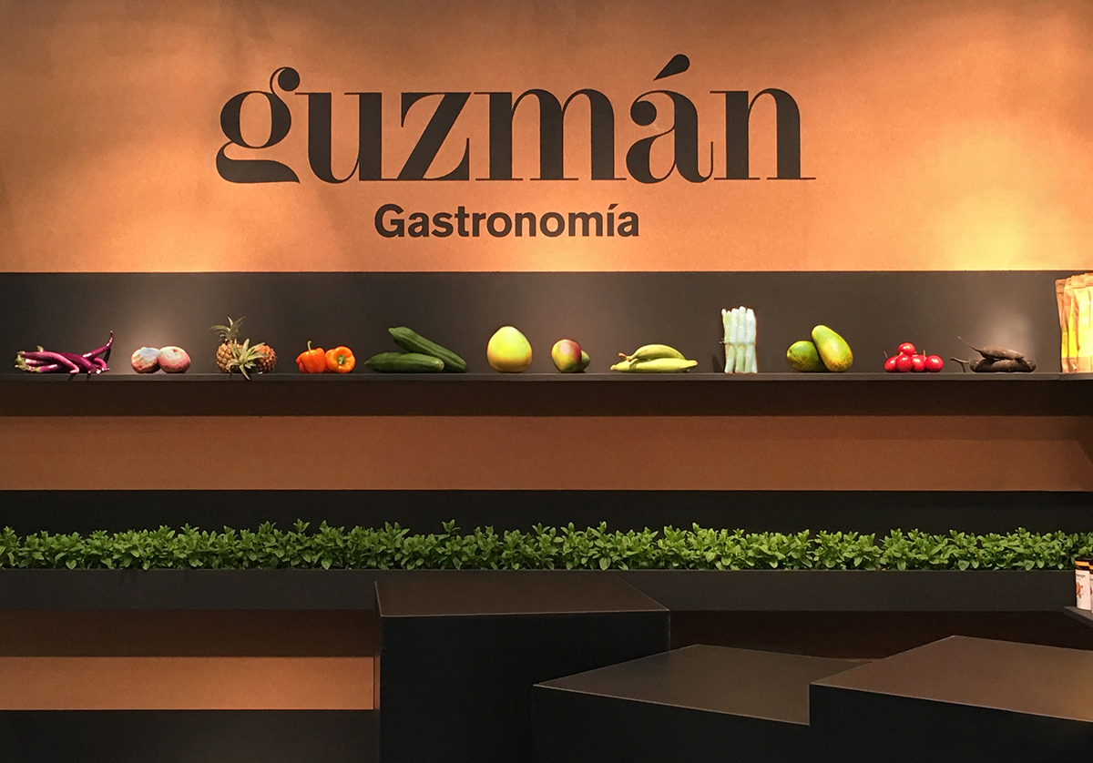 Guzmán Gastronomía - stand fair by Studio: Gris - Creative Work - $i